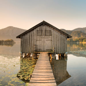 Boat hut at Kochelsee against Herzogstand and Heimgarten, Upper Bavaria, Bavaria, Germany Boat hut at Kochelsee against Herzogstand and Heimgarten, Upper Bavaria, Bavaria, Germany
